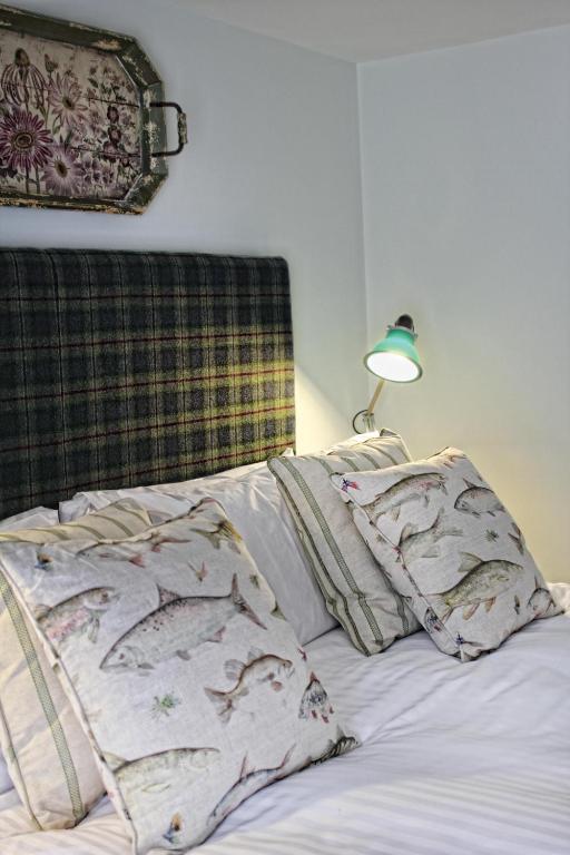 Postel nebo postele na pokoji v ubytování The Fountaine Inn
