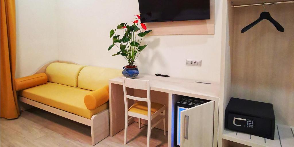 TV a/nebo společenská místnost v ubytování CSI Group - Hotel Metropoli
