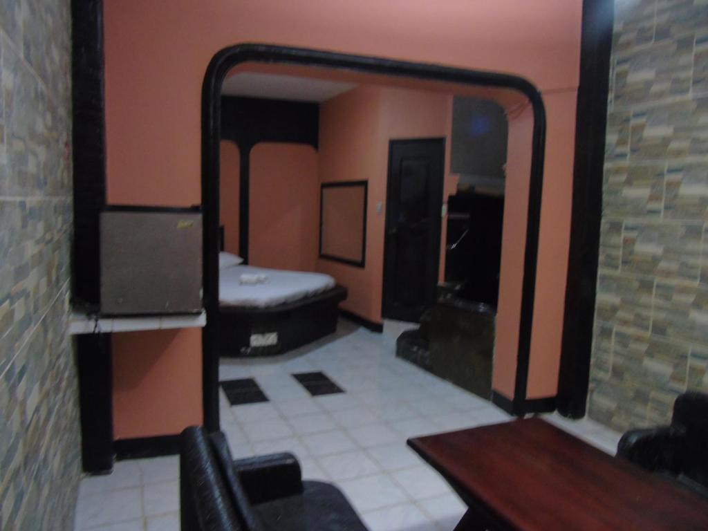 Postel nebo postele na pokoji v ubytování Hotel Imperial