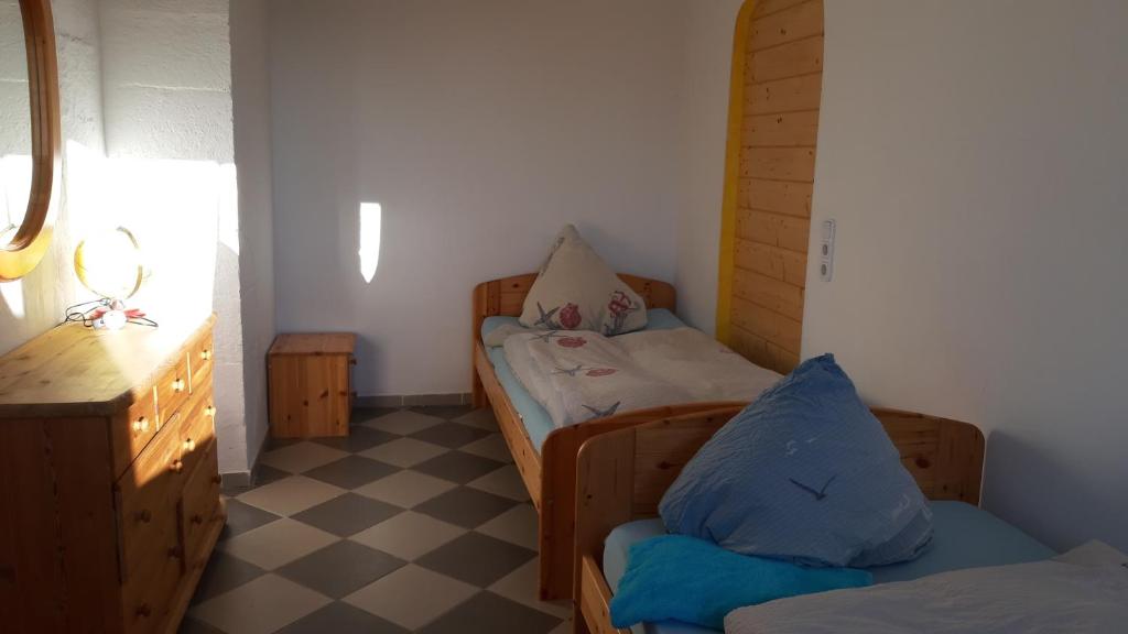 Ein Bett oder Betten in einem Zimmer der Unterkunft Ferienwohnungen mit Weitblick