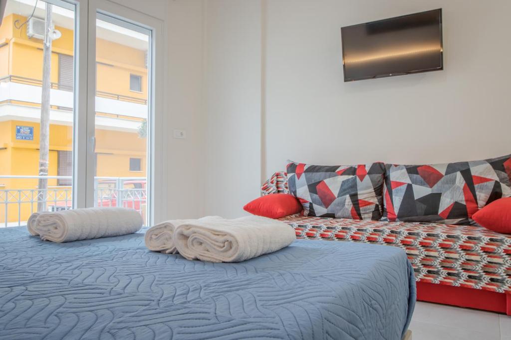 Voodi või voodid majutusasutuse The 3 Brothers' Apts toas