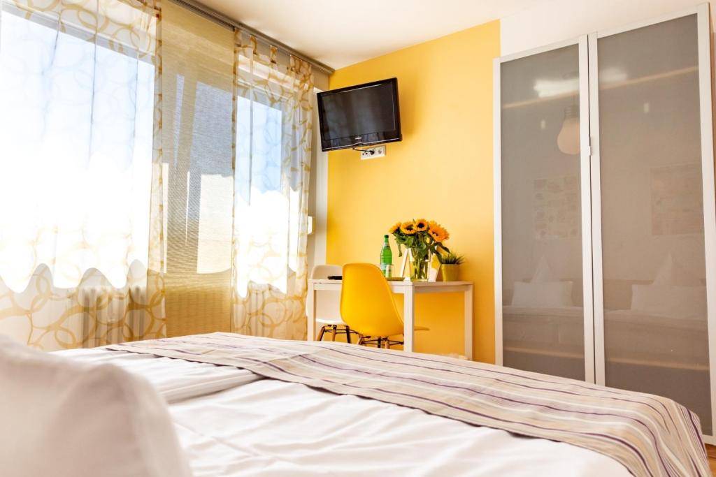 Postel nebo postele na pokoji v ubytování Scheid´s Hotel – Restaurant