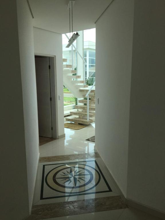  Casa Itanhaém em condomínio fechado de frente para o mar