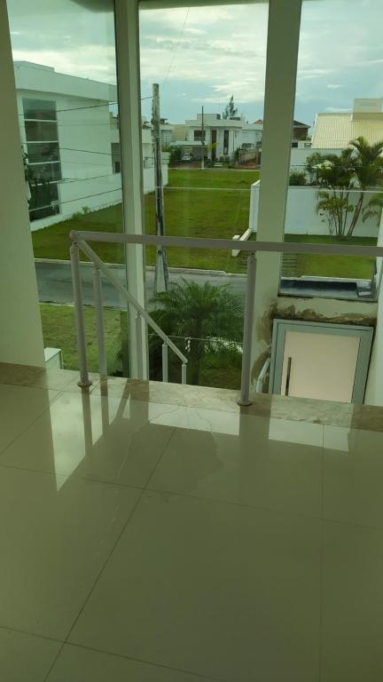  Casa Itanhaém em condomínio fechado de frente para o mar