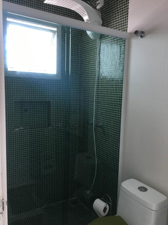  Casa Itanhaém em condomínio fechado de frente para o mar