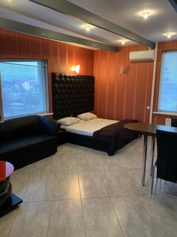 Postel nebo postele na pokoji v ubytování Na Bukovinskoy Guest House