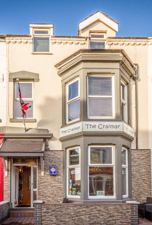 a store front of a building with the clanniment at The Craimar in Blackpool