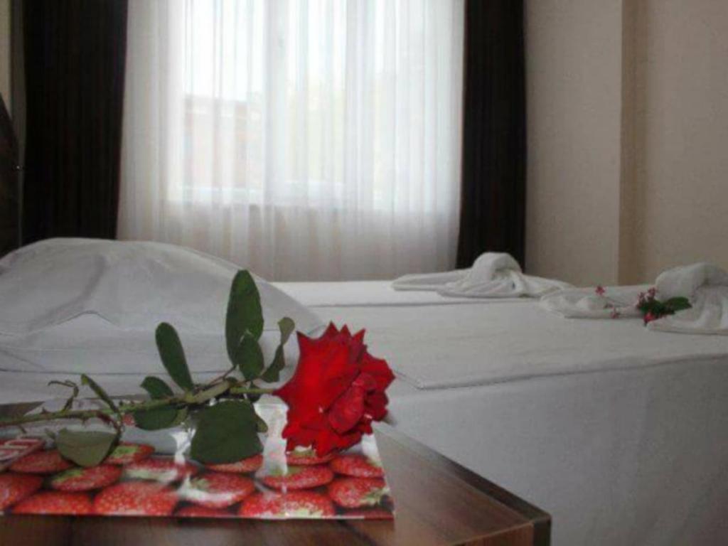 Postel nebo postele na pokoji v ubytování UnSide Apart Otel