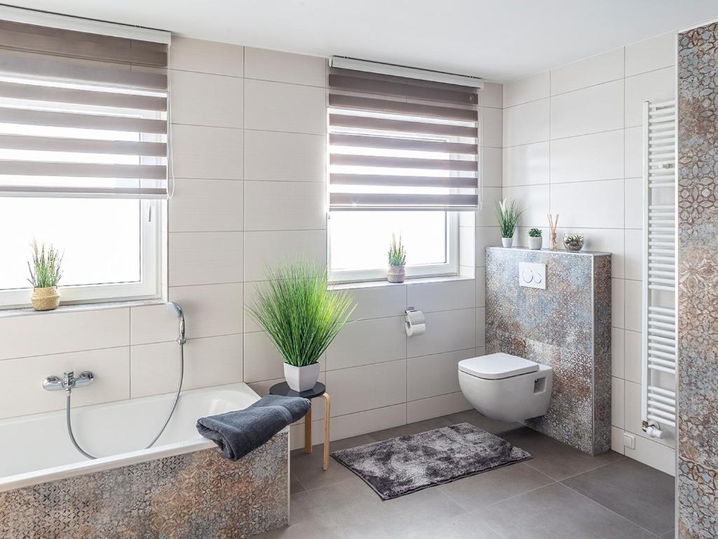 Kúpeľňa v ubytovaní Traumferienhaus XXL Ortner