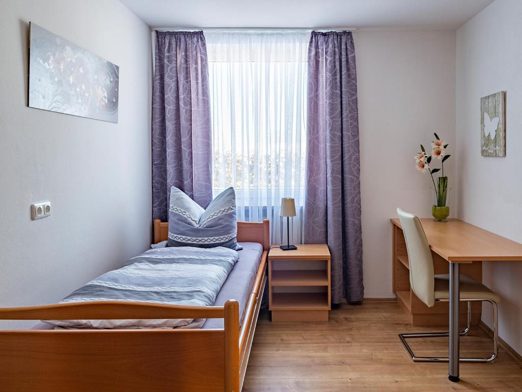 Posteľ alebo postele v izbe v ubytovaní Traumferienhaus XXL Ortner