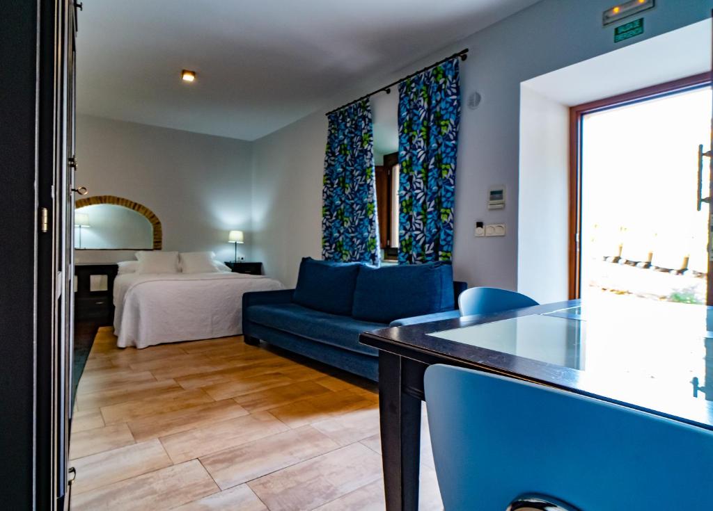 Postel nebo postele na pokoji v ubytování Hotel Alfonso IX