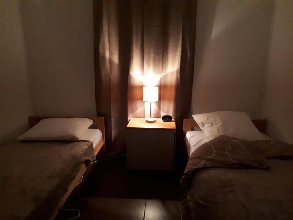 Postel nebo postele na pokoji v ubytování VILLULA