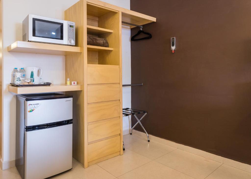 Kuchyň nebo kuchyňský kout v ubytování Nova Hotel