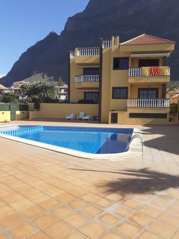 Bazén v ubytování SUNSET HOUSE EL Cieno 10A nebo v jeho okolí