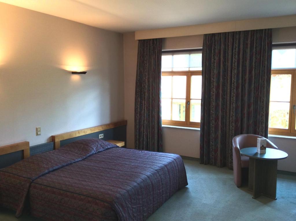Postel nebo postele na pokoji v ubytování Hotel ABBEY