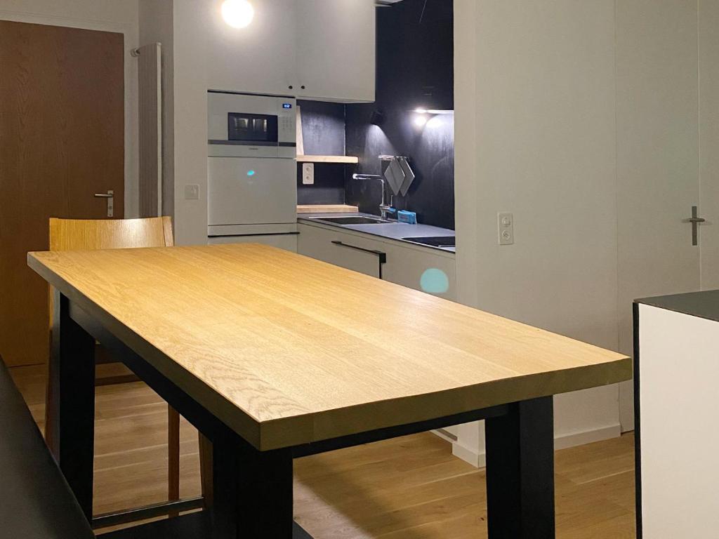 Kuchyň nebo kuchyňský kout v ubytování Grüezi Laax Apartments