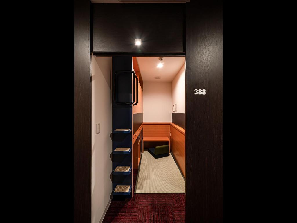 Posezení v ubytování Capsule Plus Yokohama Sauna & Capsule