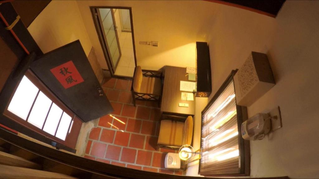 Postel nebo postele na pokoji v ubytování Grace Kinmen B&B