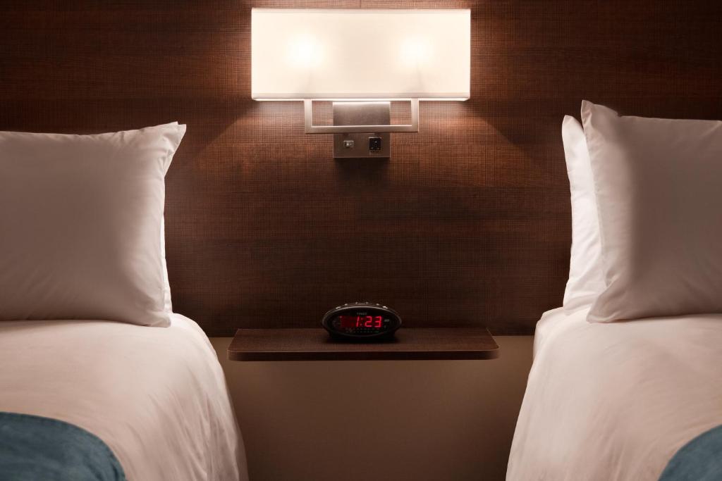 Postel nebo postele na pokoji v ubytování Steam Plant Hotel