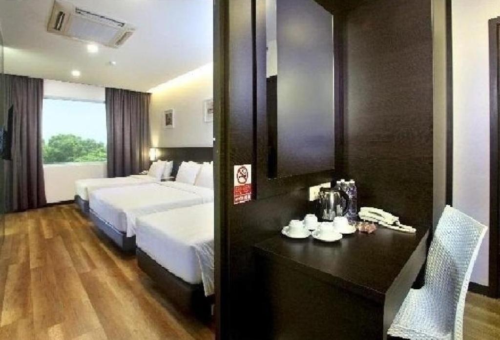 Postel nebo postele na pokoji v ubytování YANGTZE HOTEL 长江酒店