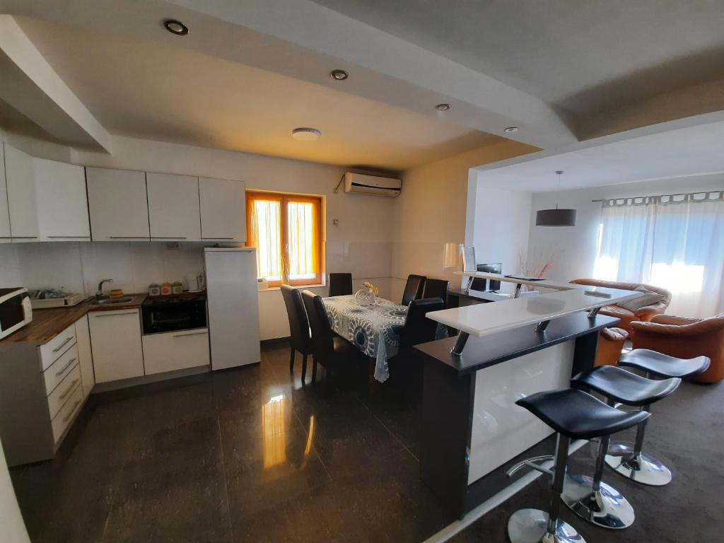 A kitchen or kitchenette at Miido Apartments