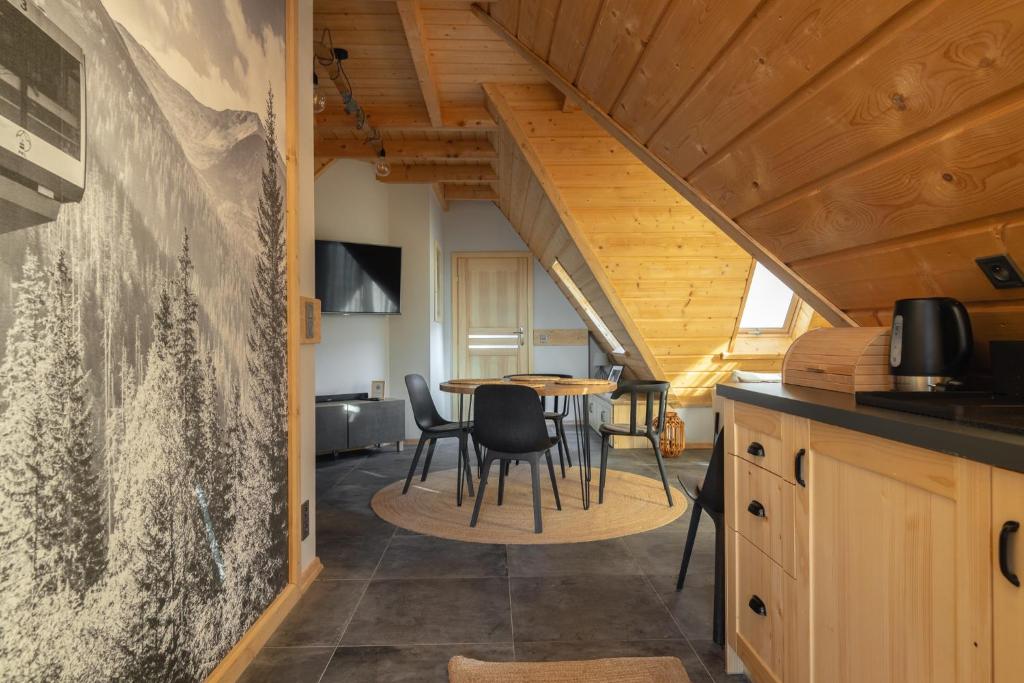 Kuchyňa alebo kuchynka v ubytovaní Apartamenty Domino - Kościelisko