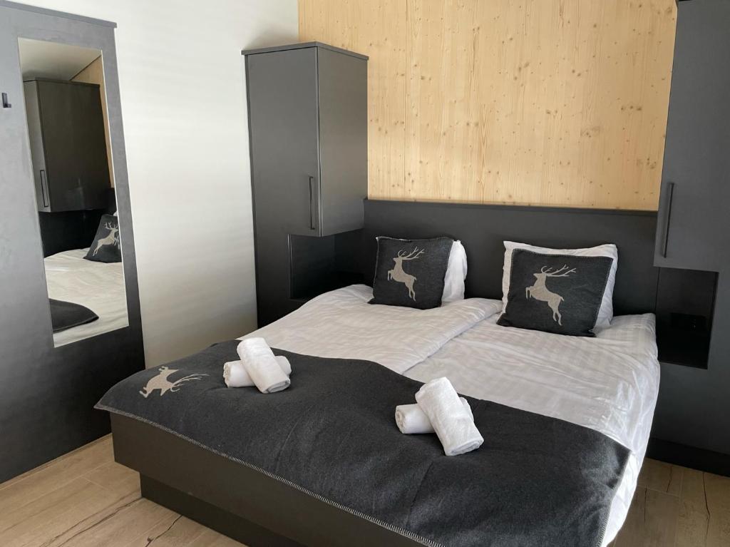 Postel nebo postele na pokoji v ubytování Villa Kreischberg
