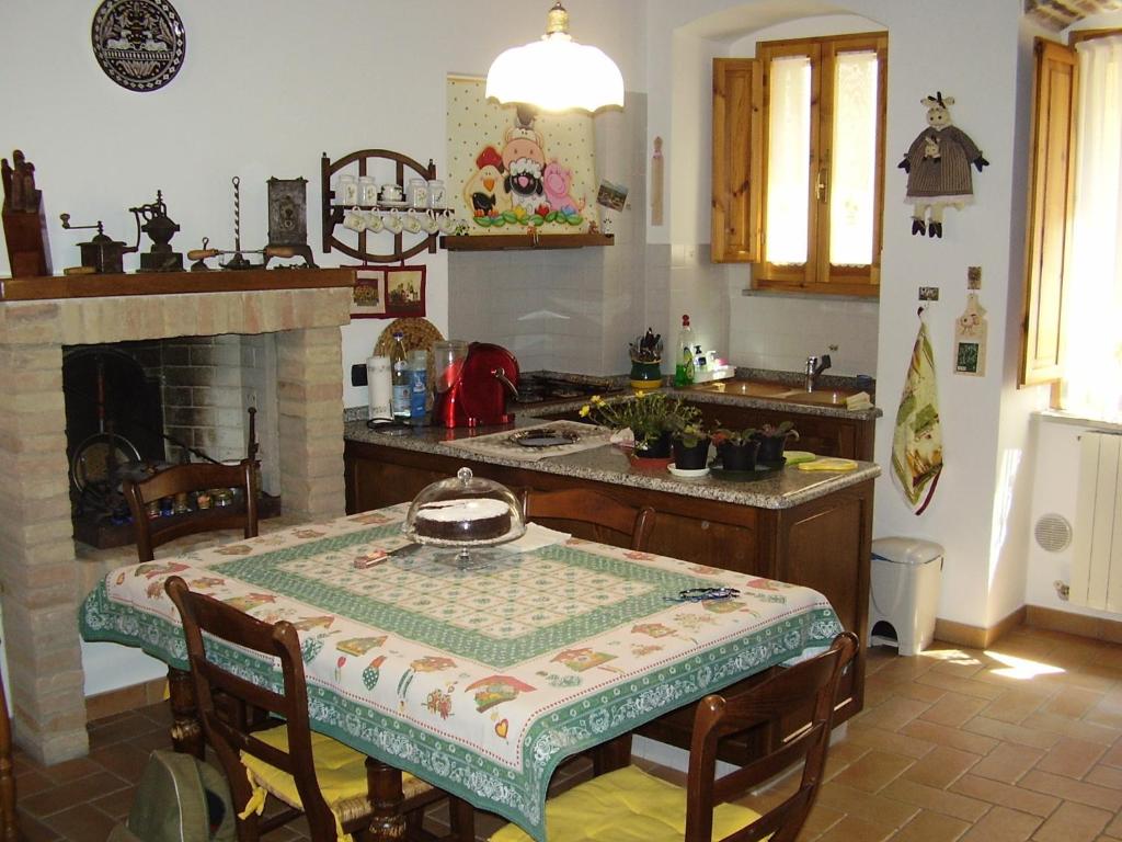 Kuchyň nebo kuchyňský kout v ubytování La terrazza fio...Rita