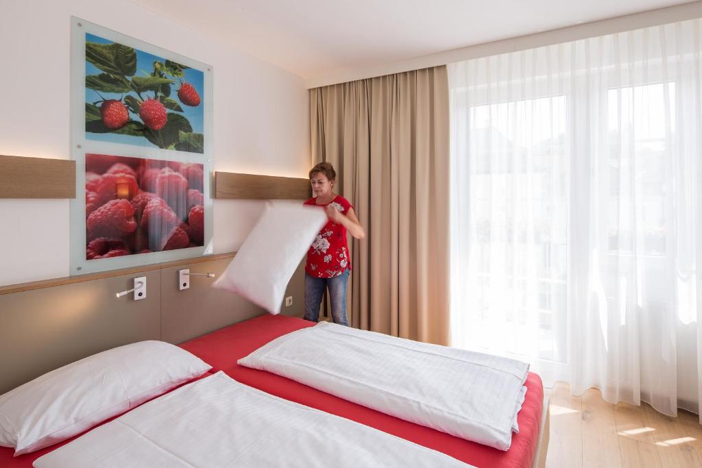 Postel nebo postele na pokoji v ubytování Hotel Stadt Melk