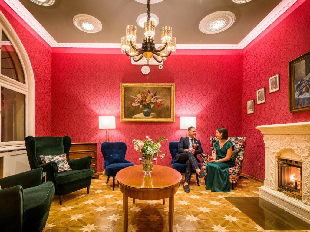 Posezení v ubytování Hotel Josefshof am Rathaus