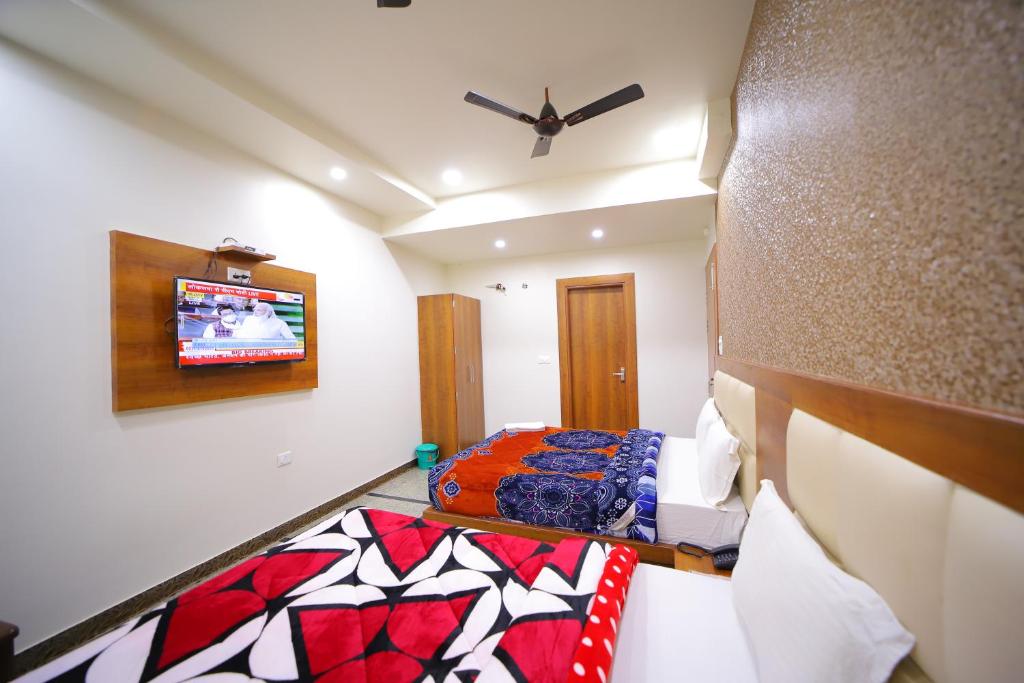 Postel nebo postele na pokoji v ubytování Hotel Royal Phoenix