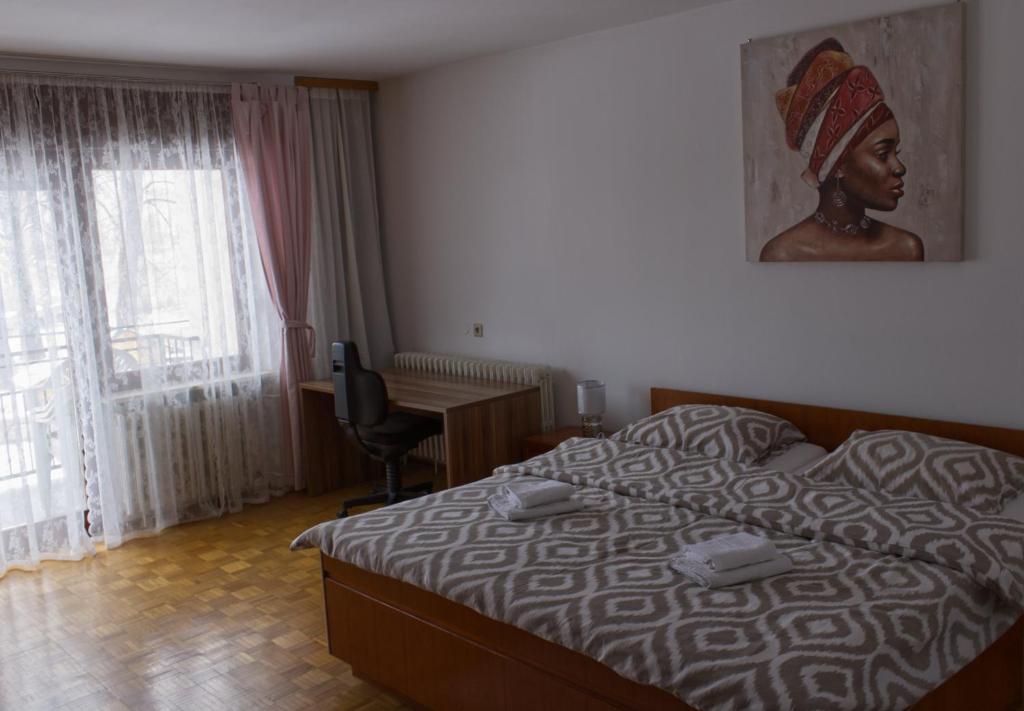 Postel nebo postele na pokoji v ubytování Gacka idila