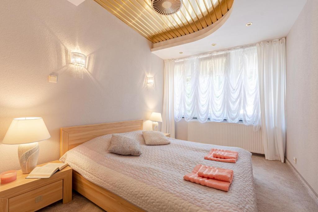Postel nebo postele na pokoji v ubytování Hotel Ustka
