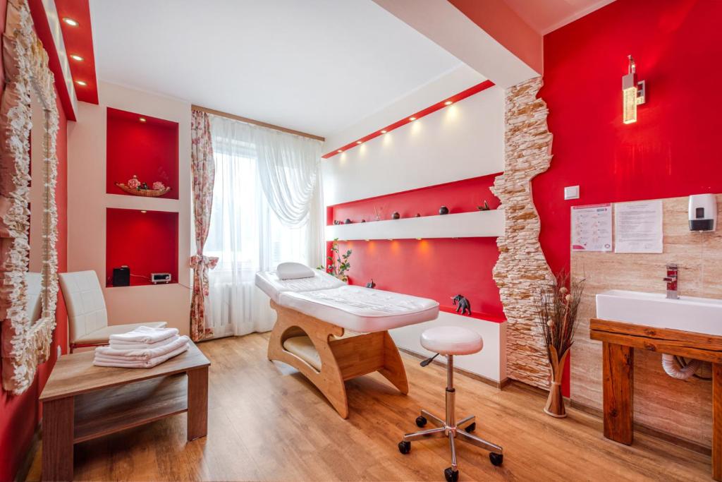 Postel nebo postele na pokoji v ubytování Hotel Ustka