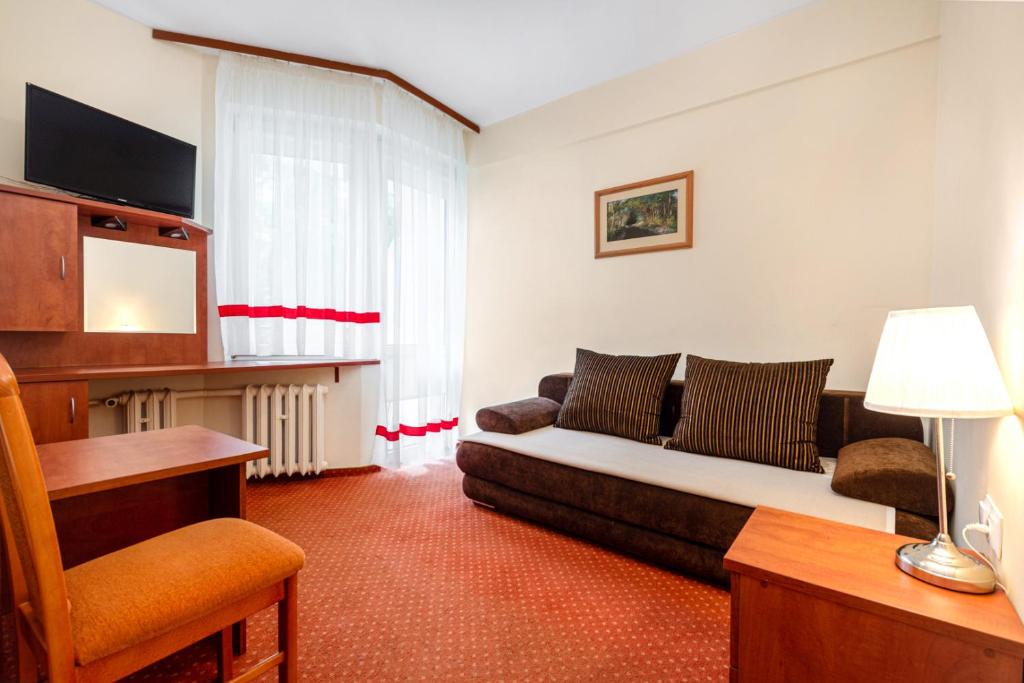 TV a/nebo společenská místnost v ubytování Hotel Ustka