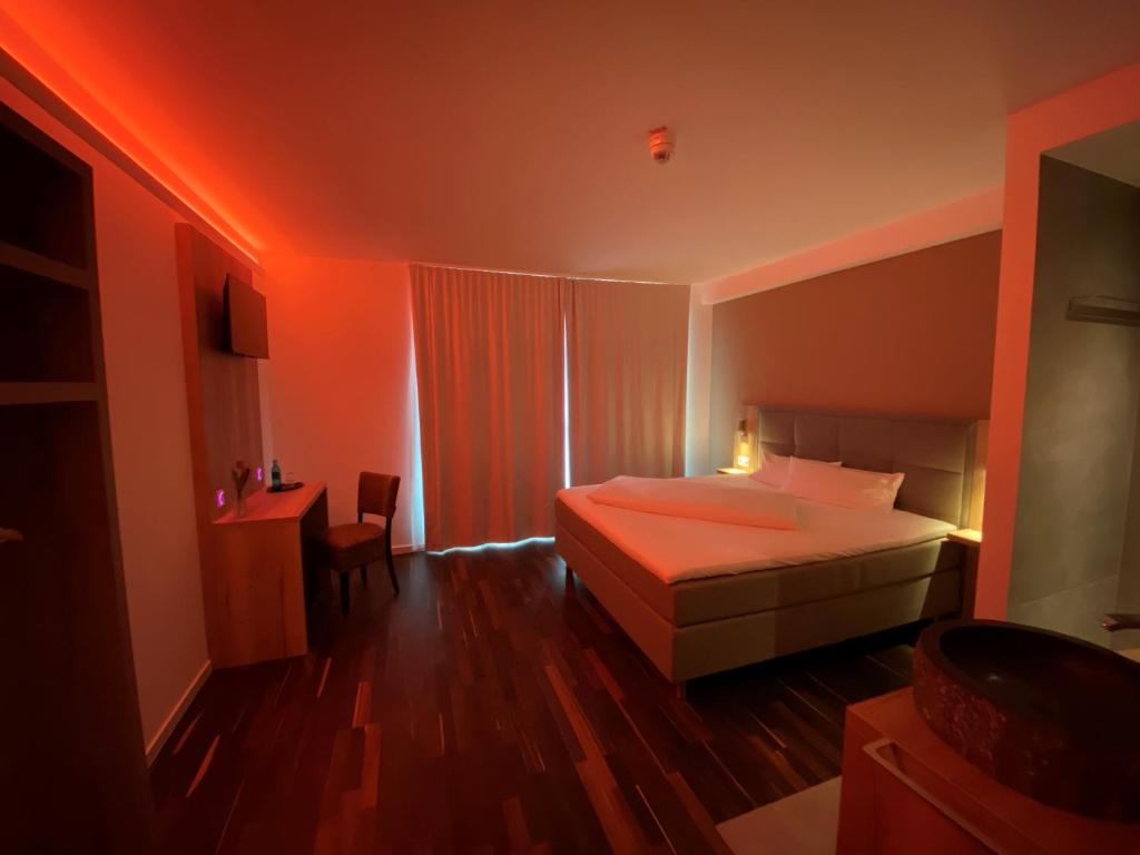 Postel nebo postele na pokoji v ubytování Hotel B4