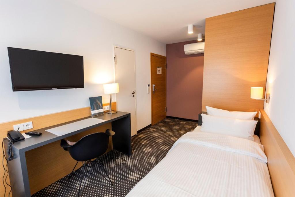 Postel nebo postele na pokoji v ubytování Hotel Otterbach