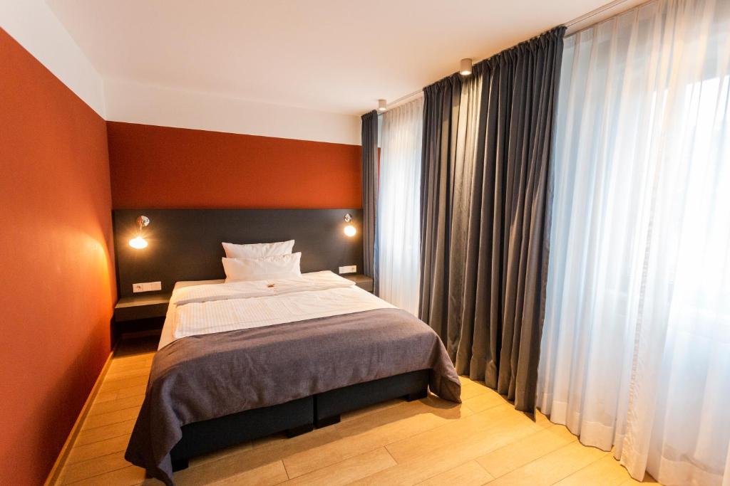 Postel nebo postele na pokoji v ubytování Hotel Otterbach