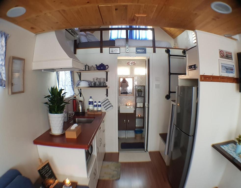 Kuchyň nebo kuchyňský kout v ubytování Tiny House B&B