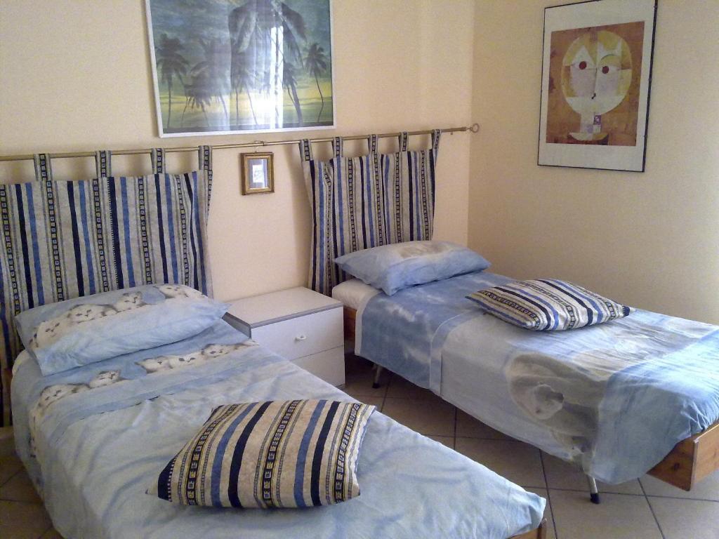 - une chambre avec 2 lits dans l'établissement B&B Anfiteatro Campano, à Santa Maria Capua Vetere