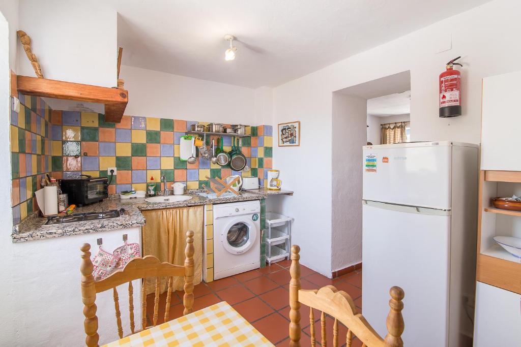 Kuchyň nebo kuchyňský kout v ubytování La Casita del Arrabal