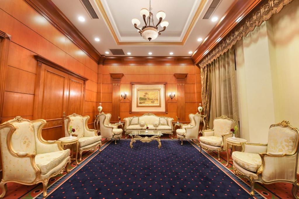 a waiting room with chairs and a chandelier at Tolip Aswan Hotel in Aswan
