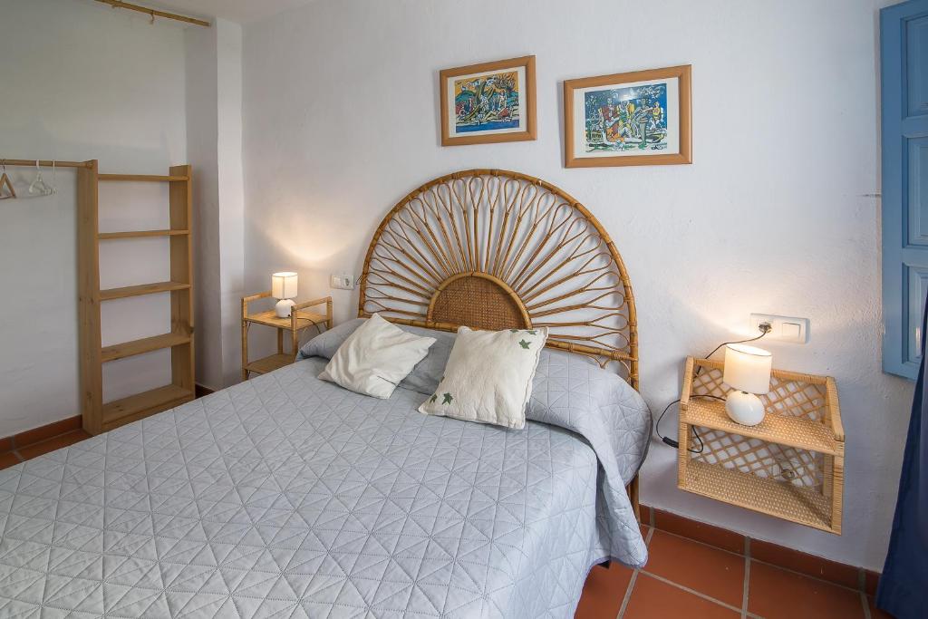 Postel nebo postele na pokoji v ubytování La Casita del Arrabal