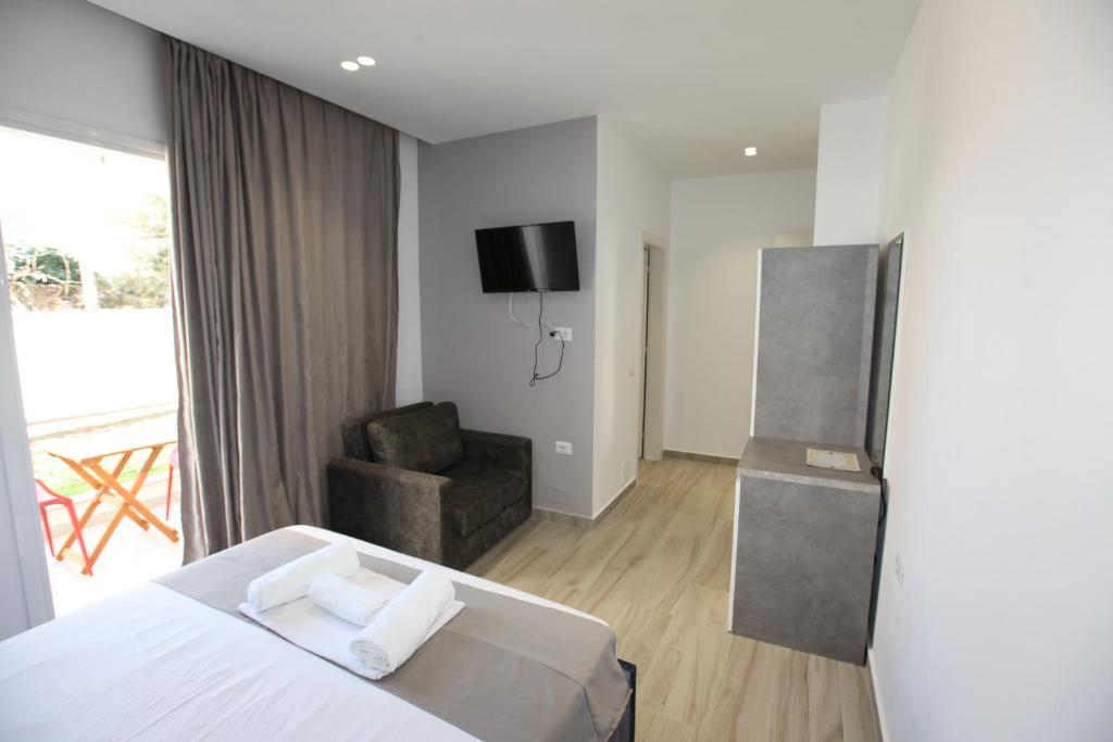 TV a/nebo společenská místnost v ubytování Hotel Bega
