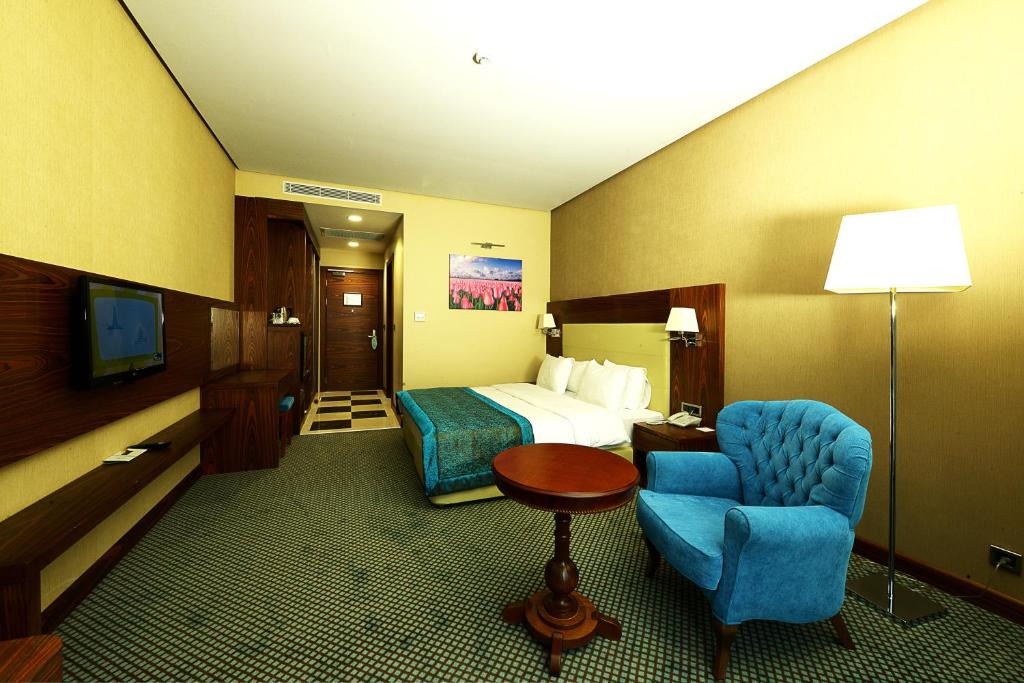 TV a/nebo společenská místnost v ubytování Margi Hotel