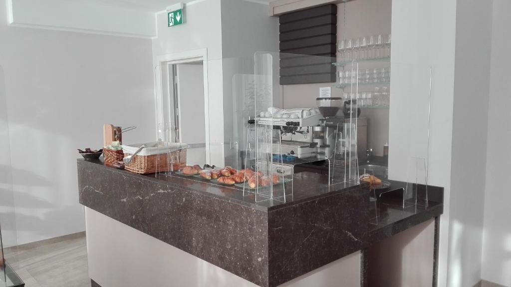 Kuchnia lub aneks kuchenny w obiekcie Novo Hotel Rossi