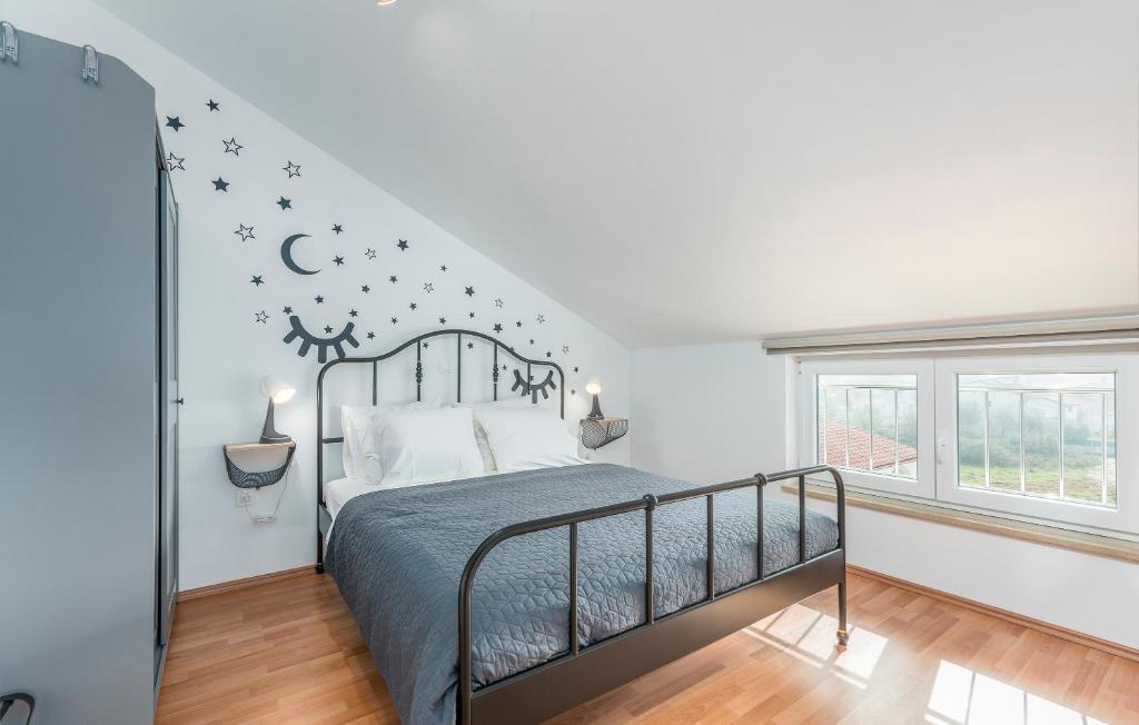 Posteľ alebo postele v izbe v ubytovaní Apartment Serena, sea view, Peroj