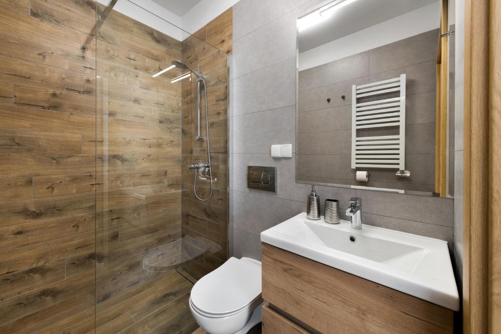 Kúpeľňa v ubytovaní Apartamenty Skibowianka