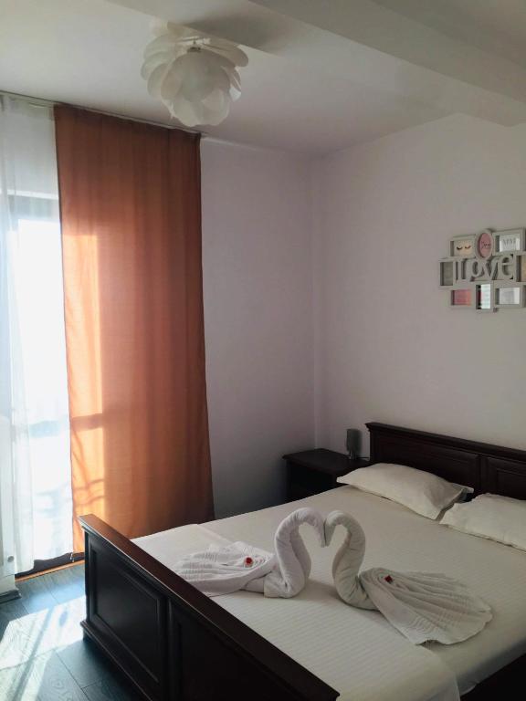 Postel nebo postele na pokoji v ubytování Casa Famous