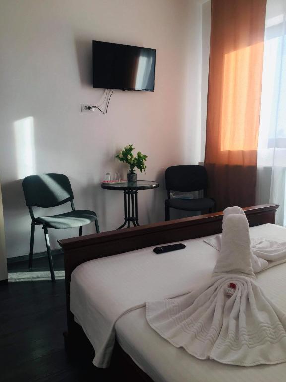 Postel nebo postele na pokoji v ubytování Casa Famous
